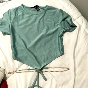 light colored teal crop top shirt from forever 21 in size small